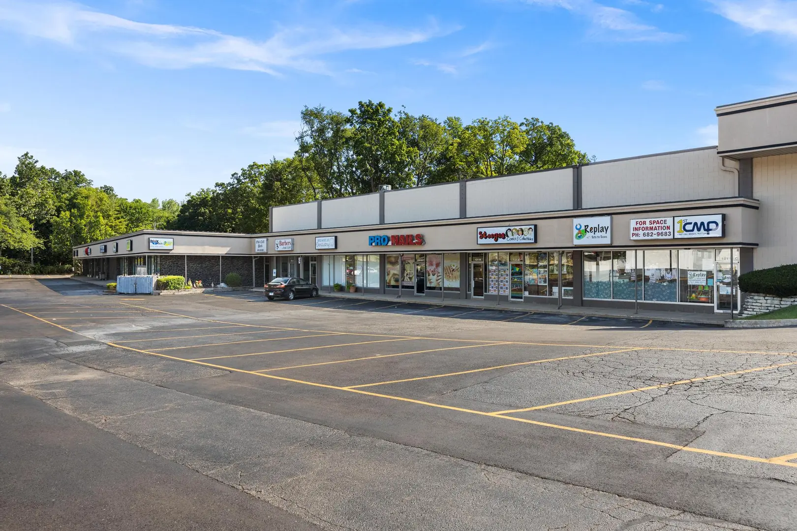 Retail Property at 4410 North Knoxville Avenue Listed by Michael Kolbus